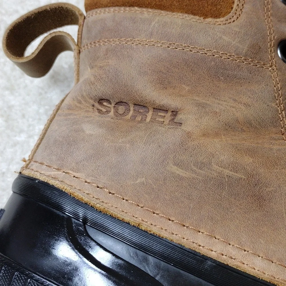 Sorel men's black rubber & tan leather winter boots. Size 11.5